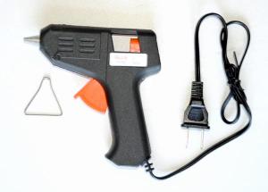 Mini traveling glue gun & 5 sticks of glue